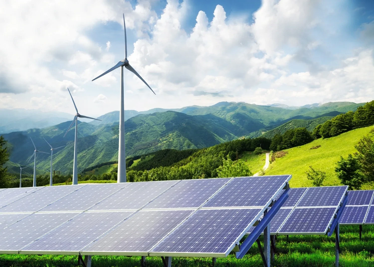 Solar panels and wind turbines generating renewable energy